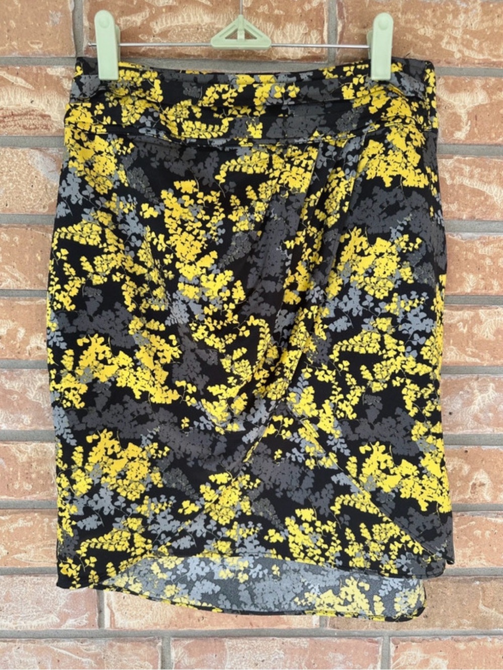 H&M Black Asymmetrical Skirt with Yellow and Gray Floral Print